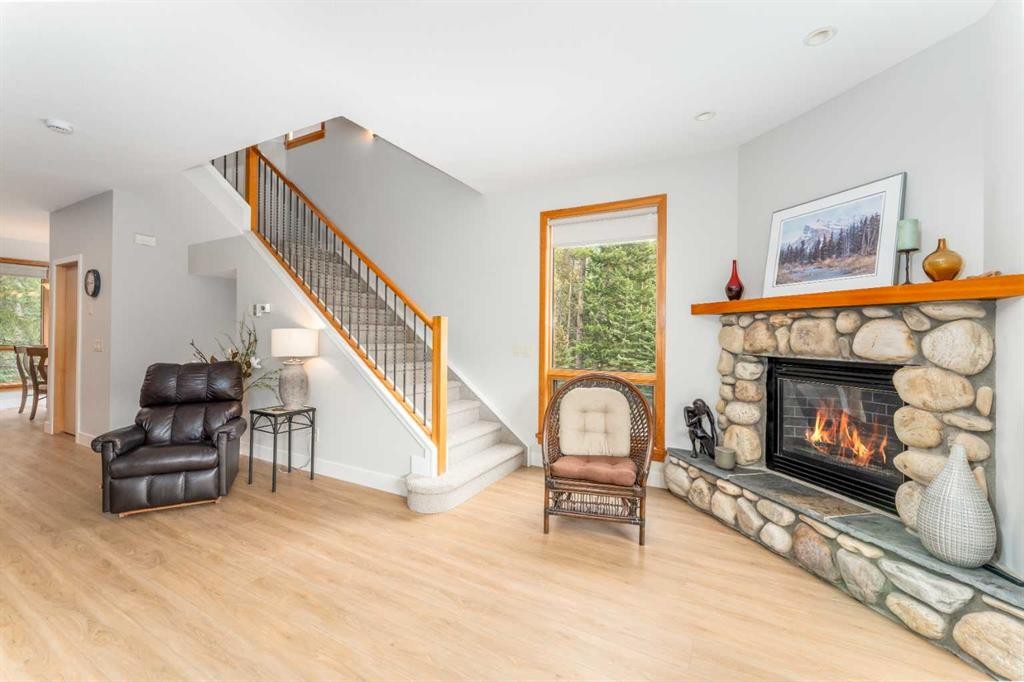 2-300 Eagle Terrace Road, Canmore, AB - Indoor Photo Showing Living Room With Fireplace