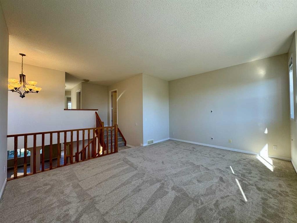 70 Glensummit Close, Cochrane, AB - Indoor Photo Showing Other Room