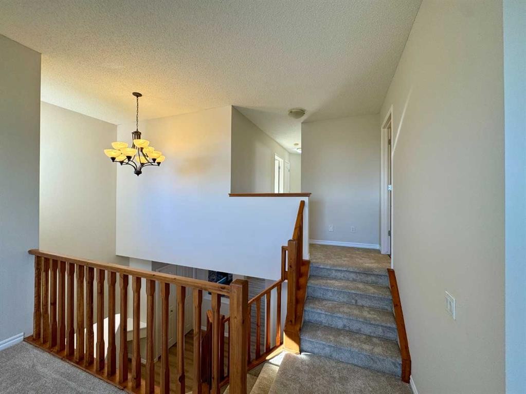 70 Glensummit Close, Cochrane, AB - Indoor Photo Showing Other Room