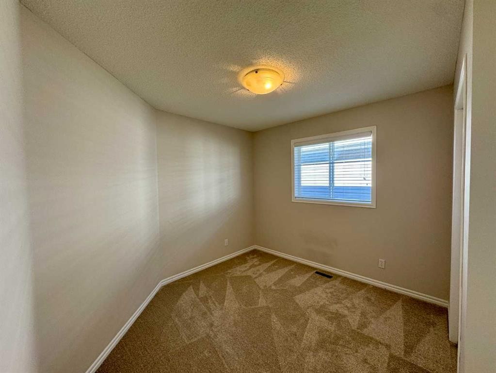 70 Glensummit Close, Cochrane, AB - Indoor Photo Showing Other Room
