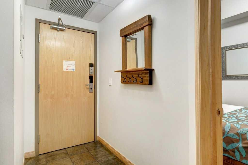 204-1151 Sidney Street, Canmore, AB - Indoor Photo Showing Other Room