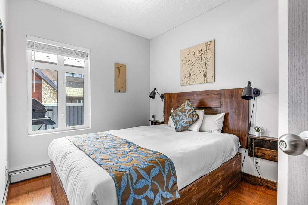 306-1151 Sidney Street, Canmore, AB - Indoor Photo Showing Bedroom