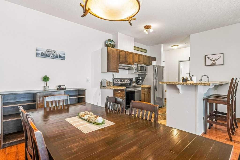 306-1151 Sidney Street, Canmore, AB - Indoor Photo Showing Dining Room