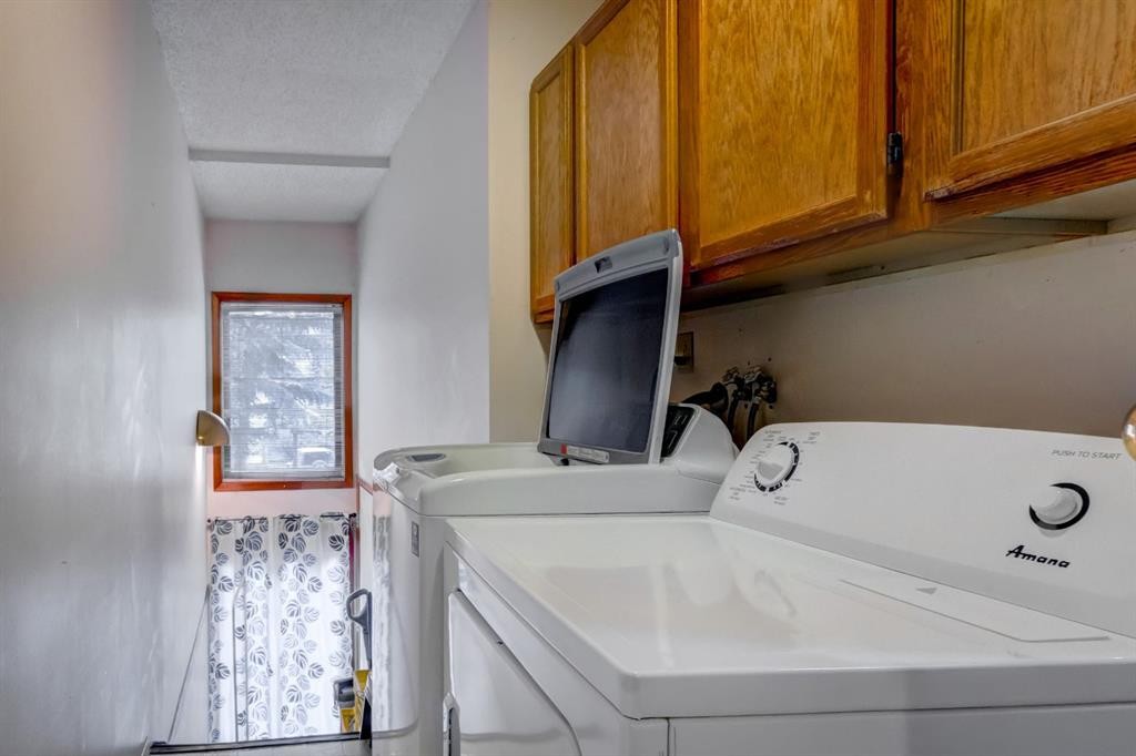 B-123 Grizzly Street, Banff, AB - Indoor Photo Showing Laundry Room