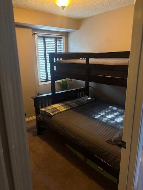 37-1199 Cabin Creek Drive, Jasper, AB - Indoor Photo Showing Bedroom