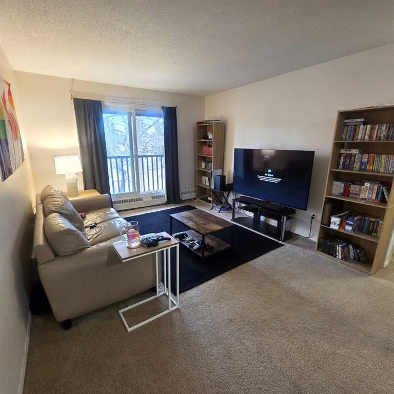 304B-5611 9 Avenue, Edson, AB - Indoor Photo Showing Living Room