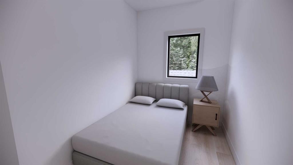 2-418 Muskrat Street, Banff, AB - Indoor Photo Showing Bedroom