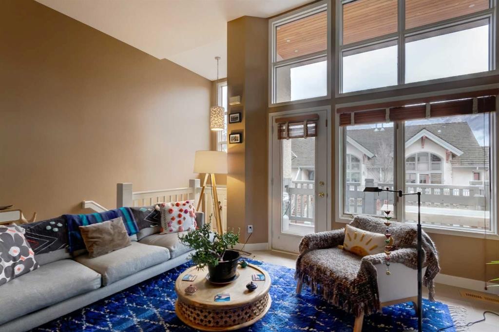 36 Antelope Lane, Banff, AB - Indoor Photo Showing Living Room