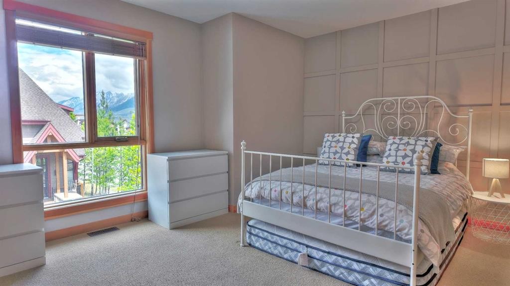1-101 Armstrong Place, Canmore, AB - Indoor Photo Showing Bedroom