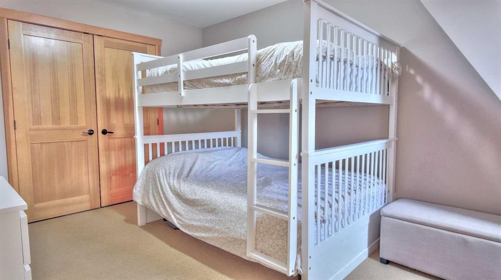 1-101 Armstrong Place, Canmore, AB - Indoor Photo Showing Bedroom