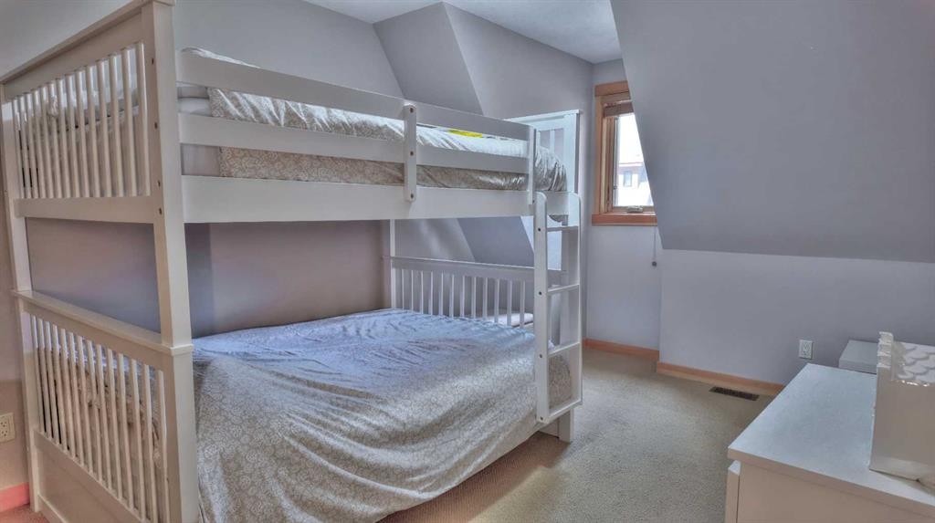 1-101 Armstrong Place, Canmore, AB - Indoor Photo Showing Bedroom