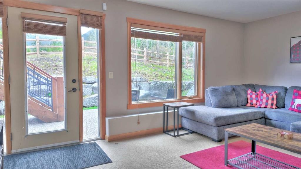 1-101 Armstrong Place, Canmore, AB - Indoor Photo Showing Living Room