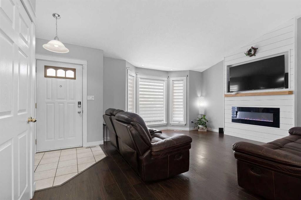 123 Mink Creek Road, Whitecourt, AB - Indoor Photo Showing Living Room With Fireplace