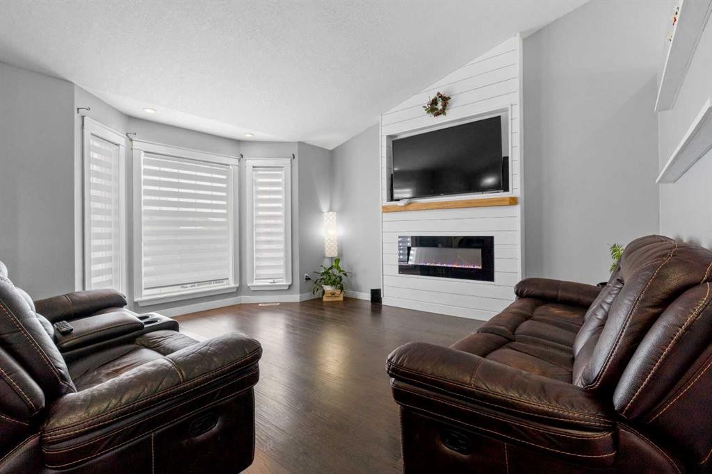 123 Mink Creek Road, Whitecourt, AB - Indoor Photo Showing Living Room With Fireplace