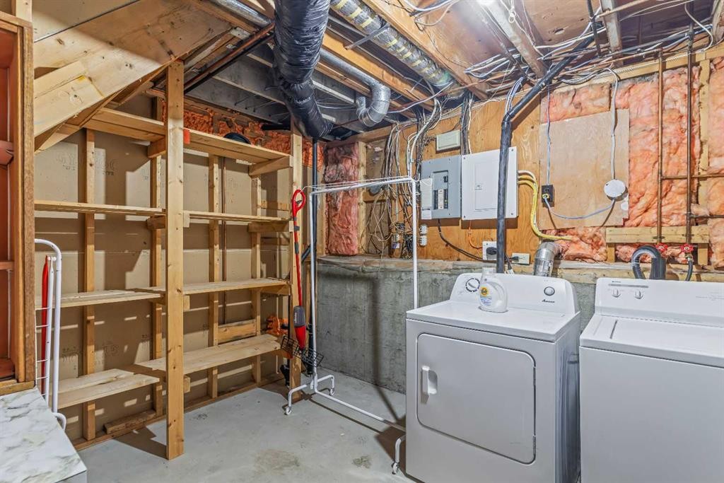 1001 9Th Avenue, Canmore, AB - Indoor Photo Showing Laundry Room