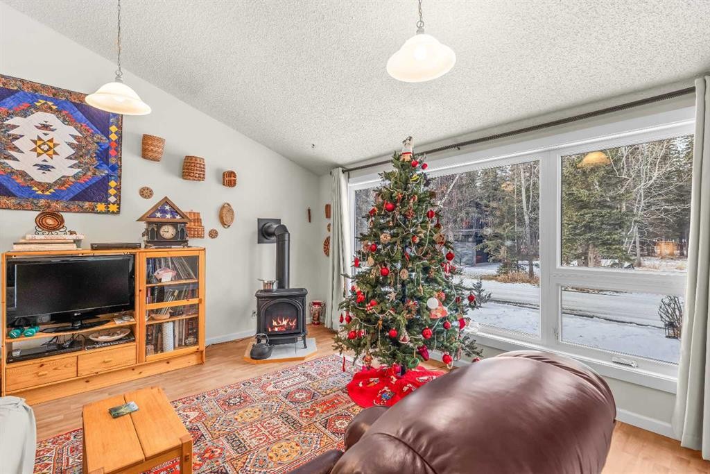 1001 9Th Avenue, Canmore, AB - Indoor With Fireplace