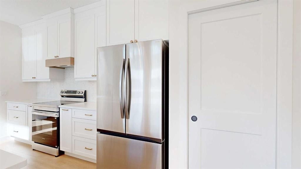 23 Riverdale Bend, Whitecourt, AB - Indoor Photo Showing Kitchen With Upgraded Kitchen