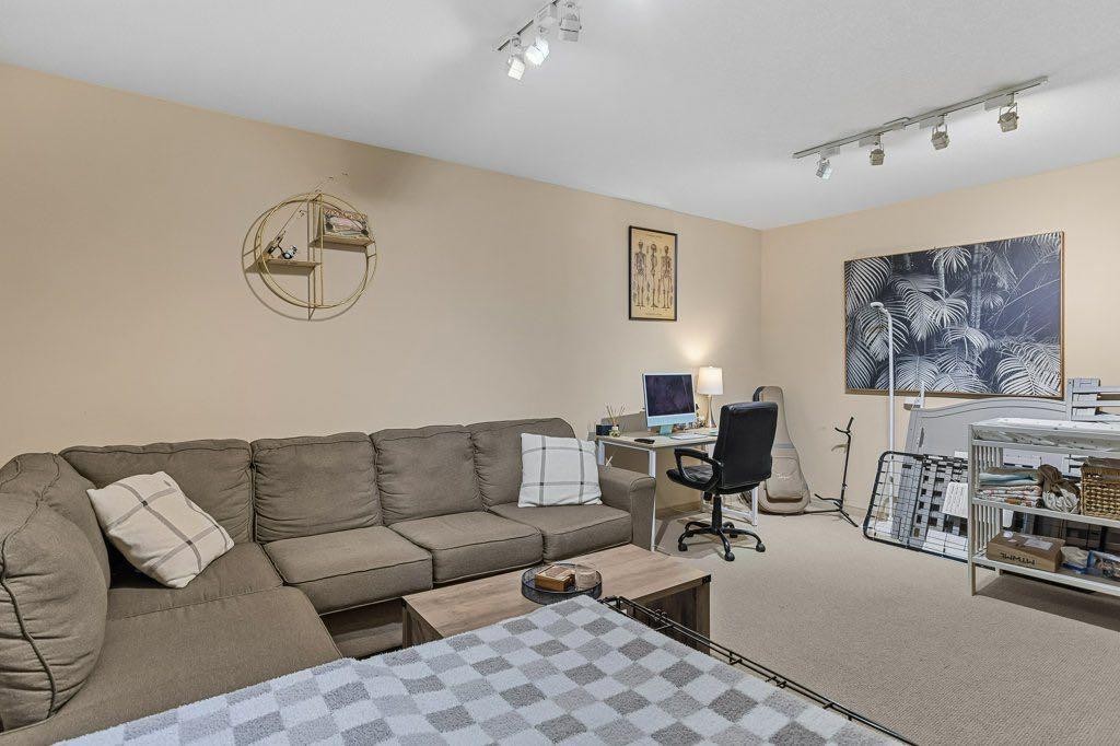 14 Antelope Lane, Banff, AB - Indoor Photo Showing Living Room