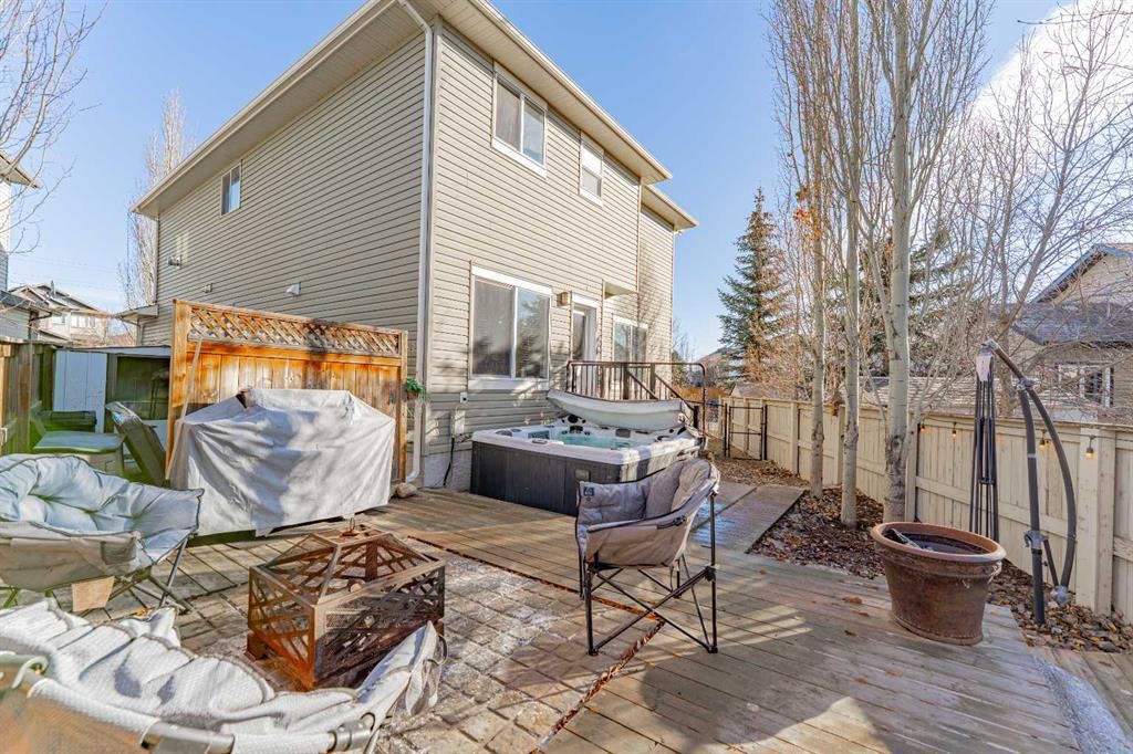 142 West Pointe Circle, Cochrane, AB - Outdoor With Deck Patio Veranda
