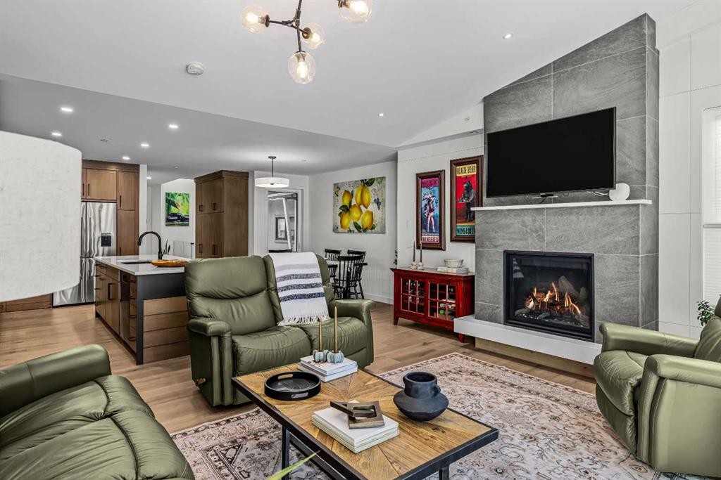 283C Three Sisters Drive, Canmore, AB - Indoor Photo Showing Living Room With Fireplace
