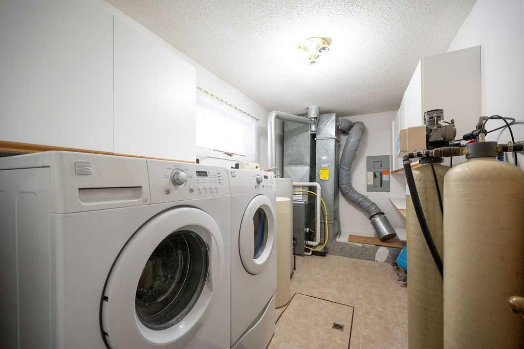87, 231054 Township Road 623A, Rural Athabasca County, AB - Indoor Photo Showing Laundry Room