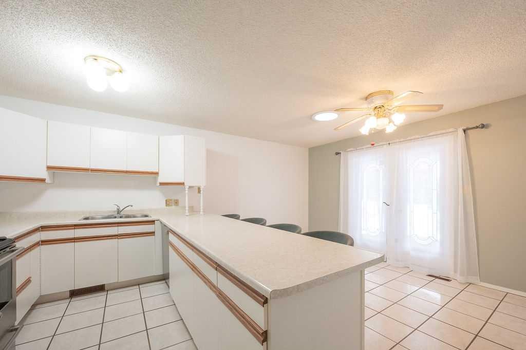 87, 231054 Township Road 623A, Rural Athabasca County, AB - Indoor Photo Showing Kitchen With Double Sink