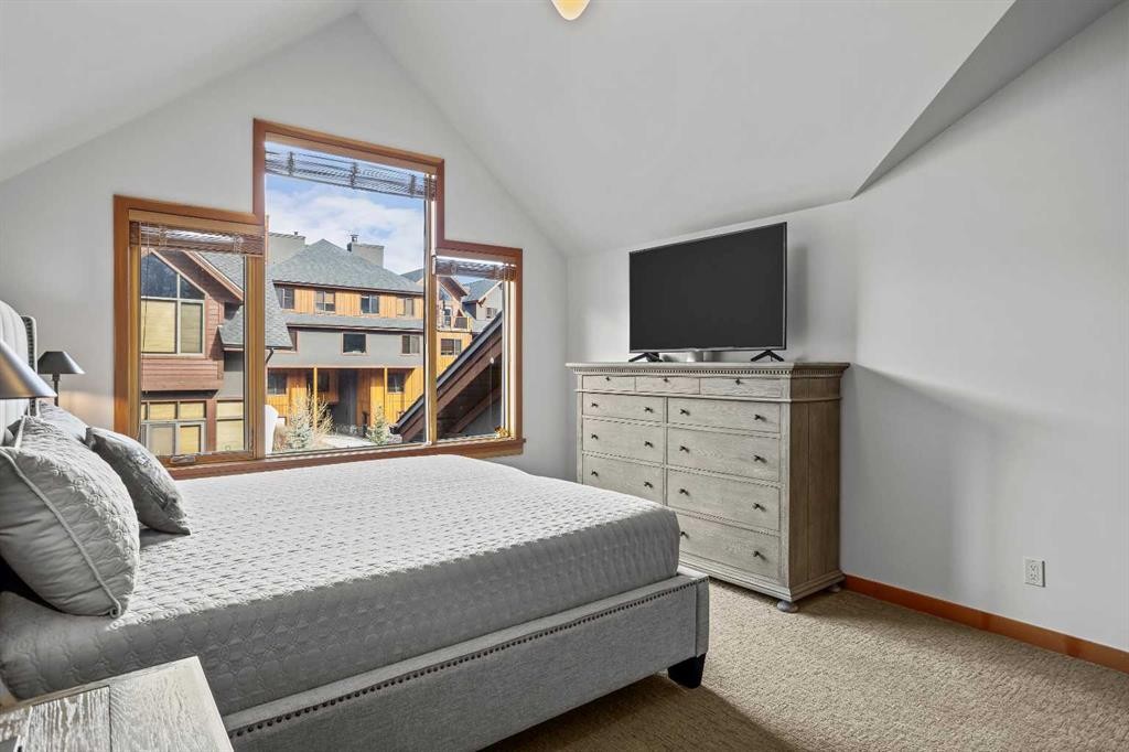 7 Creekside Mews, Canmore, AB - Indoor Photo Showing Bedroom