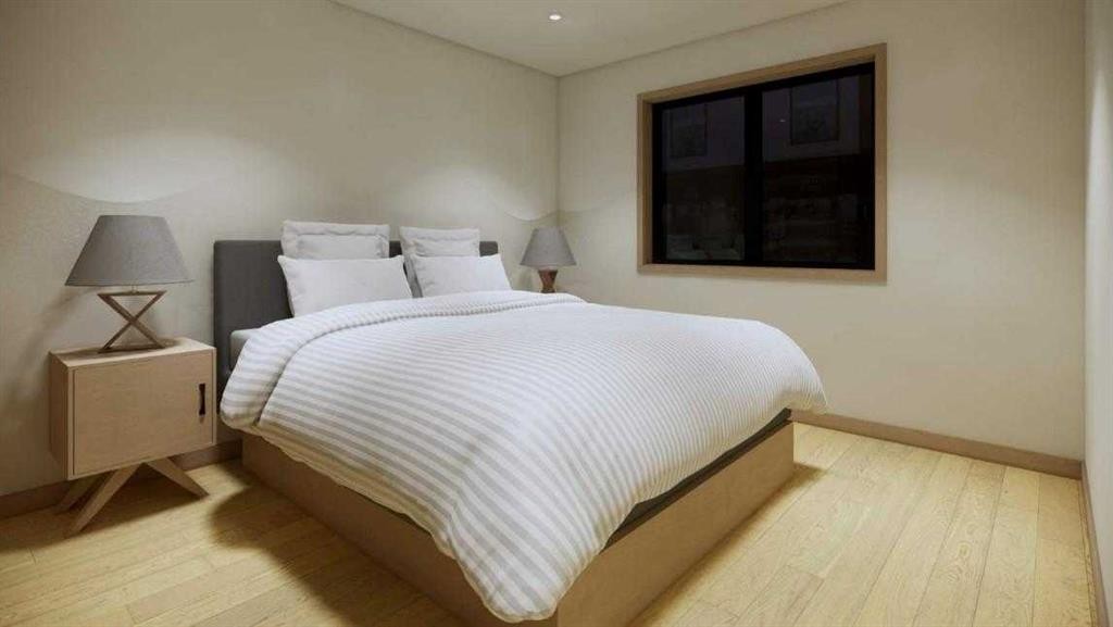 713B 4Th Street, Canmore, AB - Indoor Photo Showing Bedroom