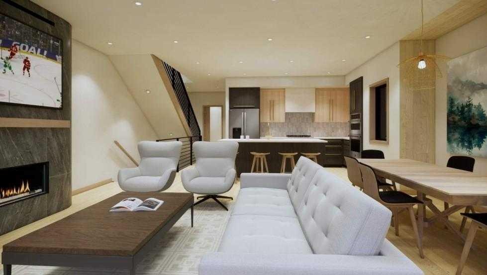 713B 4Th Street, Canmore, AB - Indoor Photo Showing Living Room With Fireplace