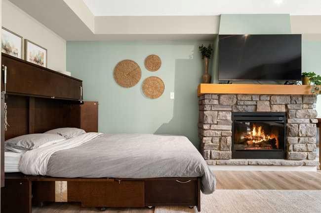 2206-250 2 Avenue, Dead Man'S Flats, AB - Indoor With Fireplace