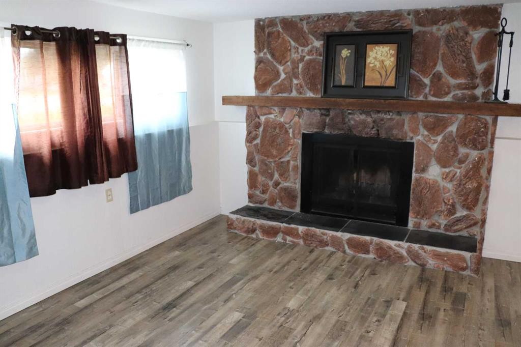 5518 13 Avenue, Edson, AB - Indoor Photo Showing Living Room With Fireplace