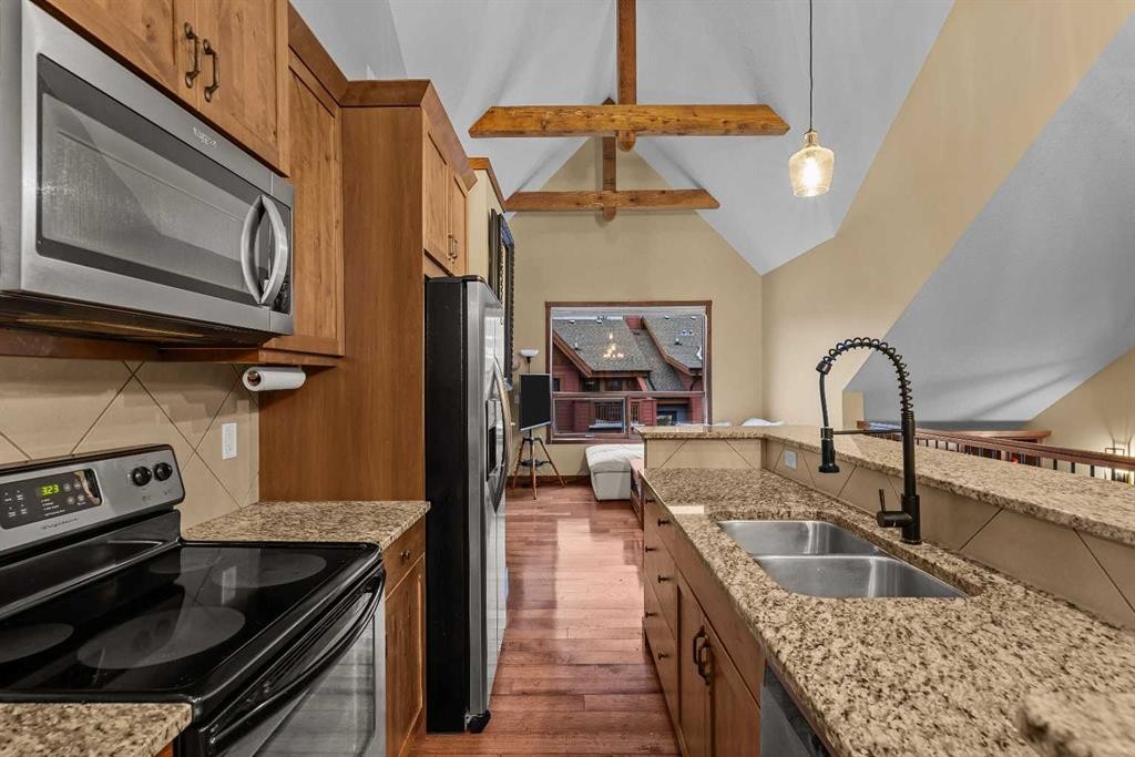623-80 Dyrgas Gate, Canmore, AB - Indoor Photo Showing Kitchen With Double Sink