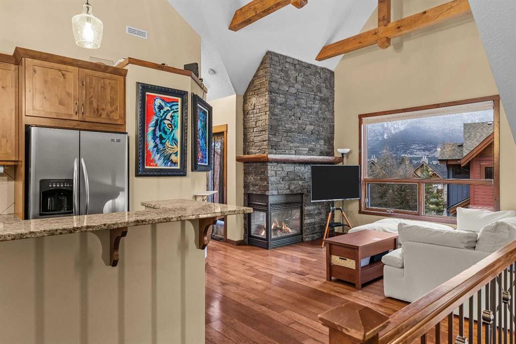 623-80 Dyrgas Gate, Canmore, AB - Indoor With Fireplace