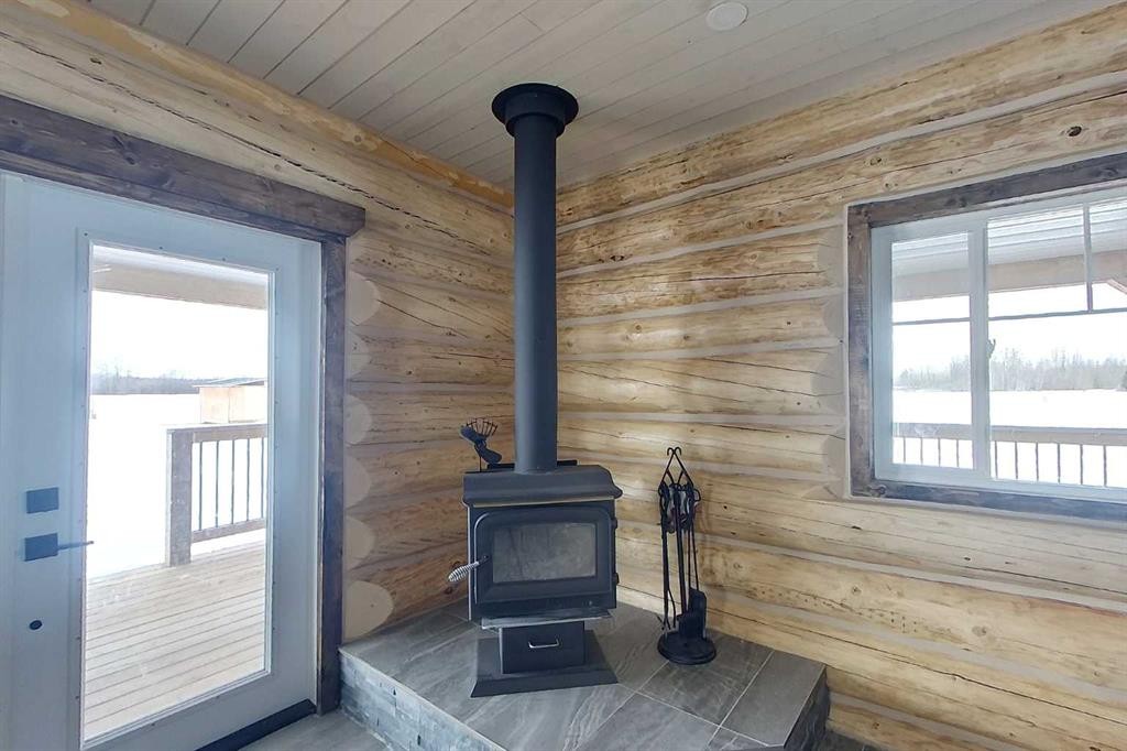 73430 102 Range, Kinuso, AB - Indoor Photo Showing Other Room With Fireplace