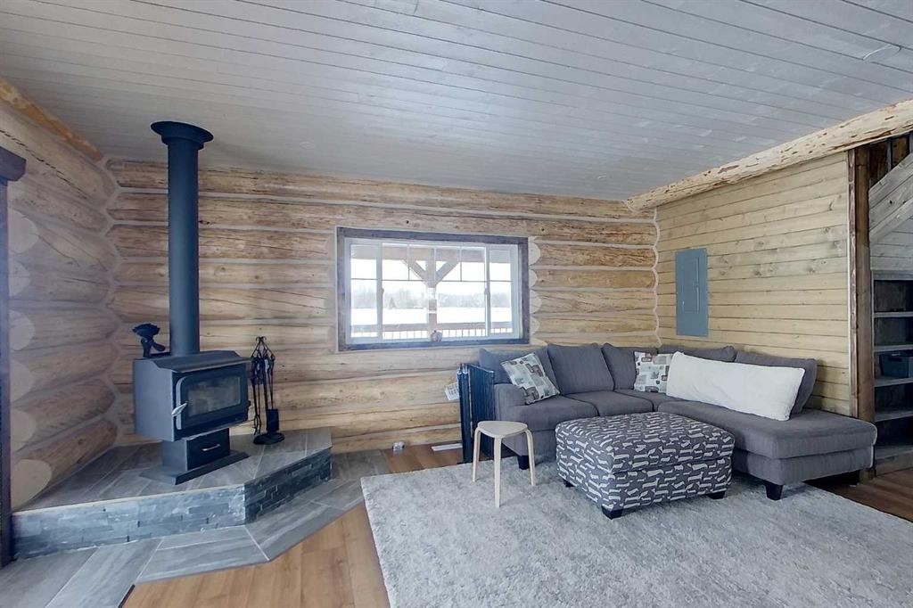 73430 102 Range, Kinuso, AB - Indoor Photo Showing Living Room With Fireplace