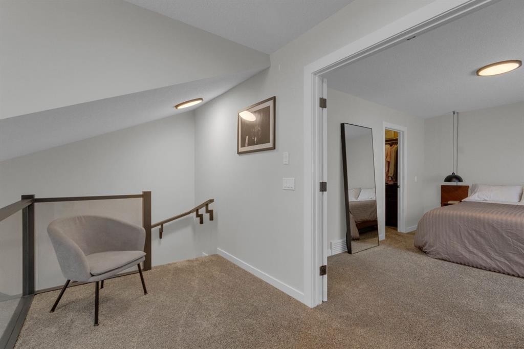 2-729 7Th, Canmore, AB - Indoor Photo Showing Bedroom