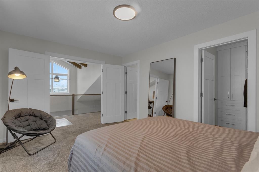 2-729 7Th, Canmore, AB - Indoor Photo Showing Bedroom