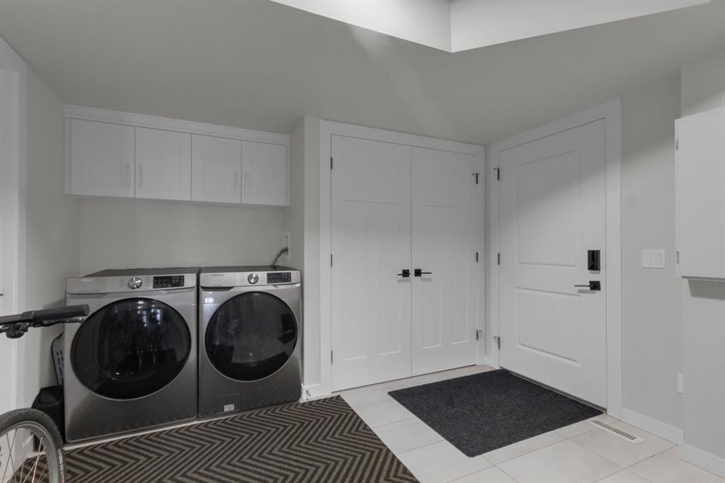 2-729 7Th, Canmore, AB - Indoor Photo Showing Laundry Room