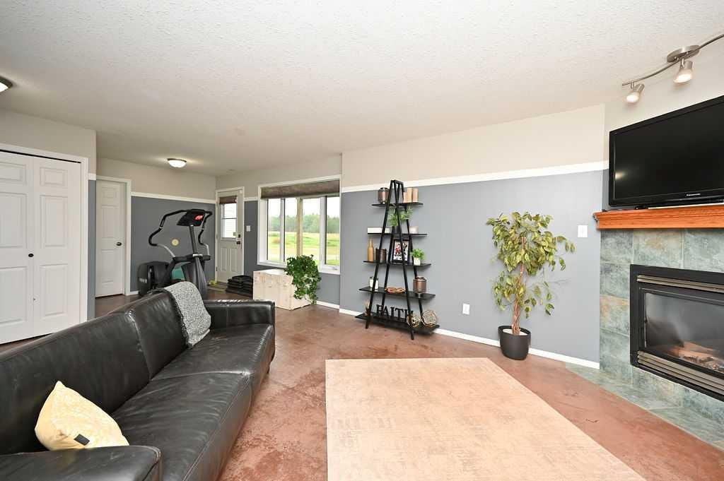 192042 Township Road 665, Athabasca, AB - Indoor Photo Showing Living Room With Fireplace
