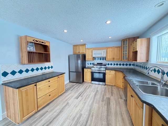 4230 Caribou Crescent, Wabasca, AB - Indoor Photo Showing Kitchen With Double Sink