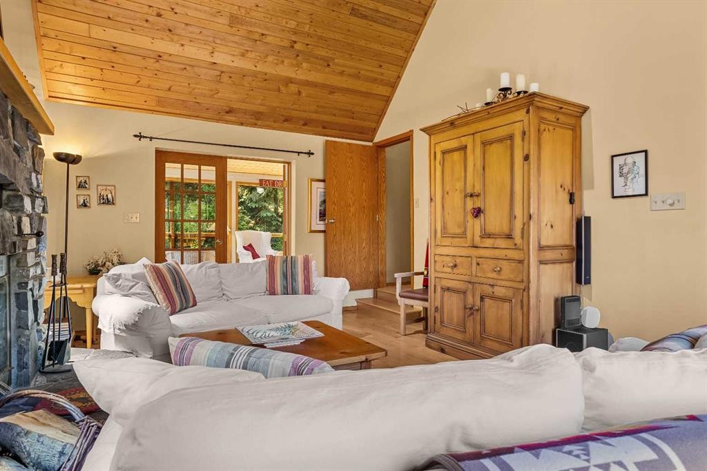 204 Grassi Place, Canmore, AB - Indoor Photo Showing Living Room With Fireplace