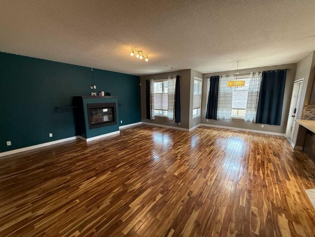 107 Wolf Willow Cove, Hinton, AB - Indoor Photo Showing Living Room With Fireplace