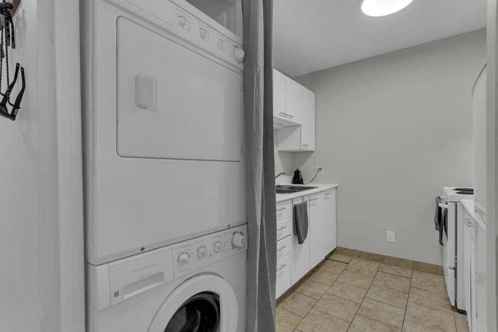 111-414 Squirrel Street, Banff, AB - Indoor Photo Showing Laundry Room
