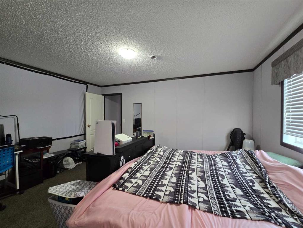 606 52 Street, Edson, AB - Indoor Photo Showing Bedroom