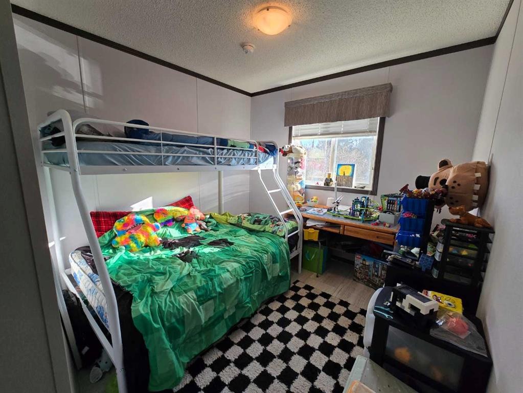606 52 Street, Edson, AB - Indoor Photo Showing Bedroom