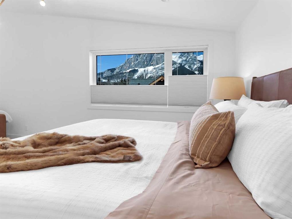 512 8Th Avenue, Canmore, AB - Indoor Photo Showing Bedroom