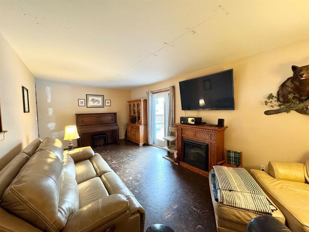 611 4 Avenue, Fox Creek, AB - Indoor Photo Showing Living Room With Fireplace