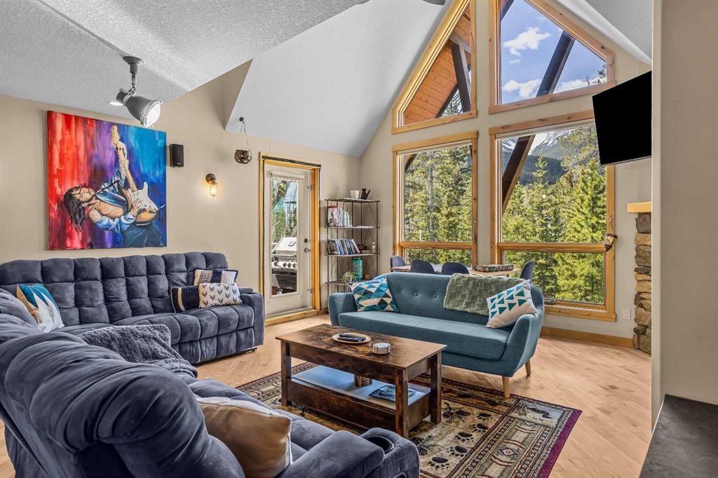 302-2100A Stewart Creek Drive, Canmore, AB - Indoor Photo Showing Living Room