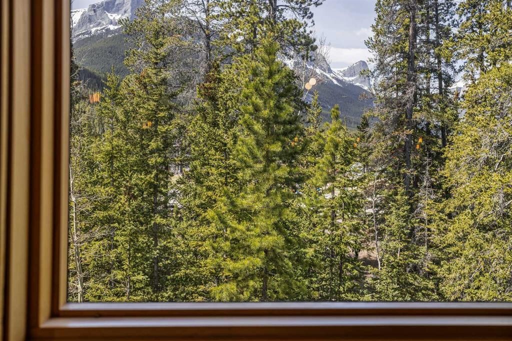 302-2100A Stewart Creek Drive, Canmore, AB - With View