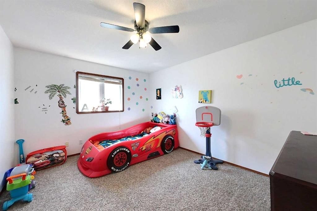 23 Springwood Drive Ne, Slave Lake, AB - Indoor Photo Showing Bedroom